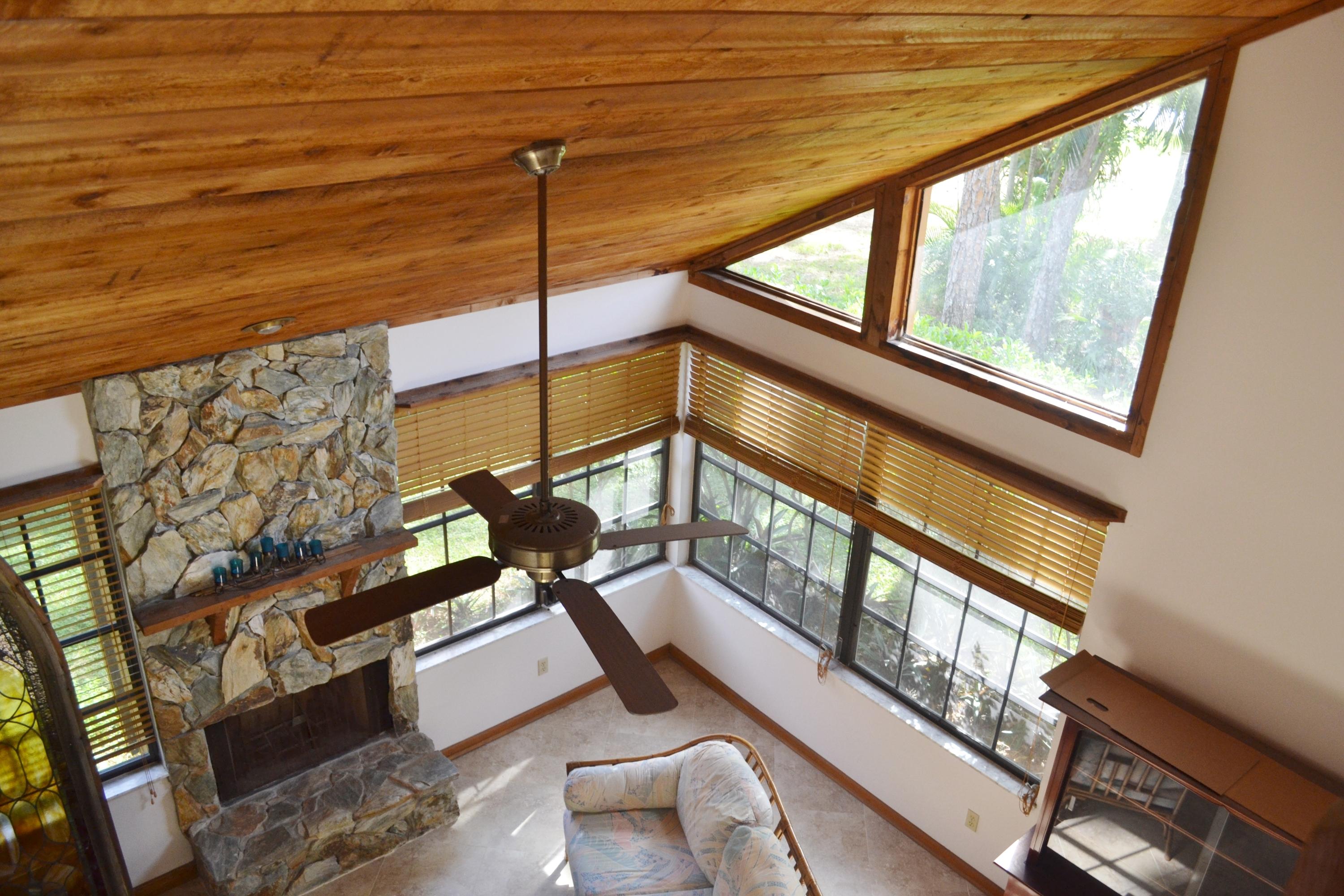 6063 Wood Lake Road Jupiter, FL 33458 - Photo 31 of 60 WOOD PANELED CIELING VIEWED FROM LOFT