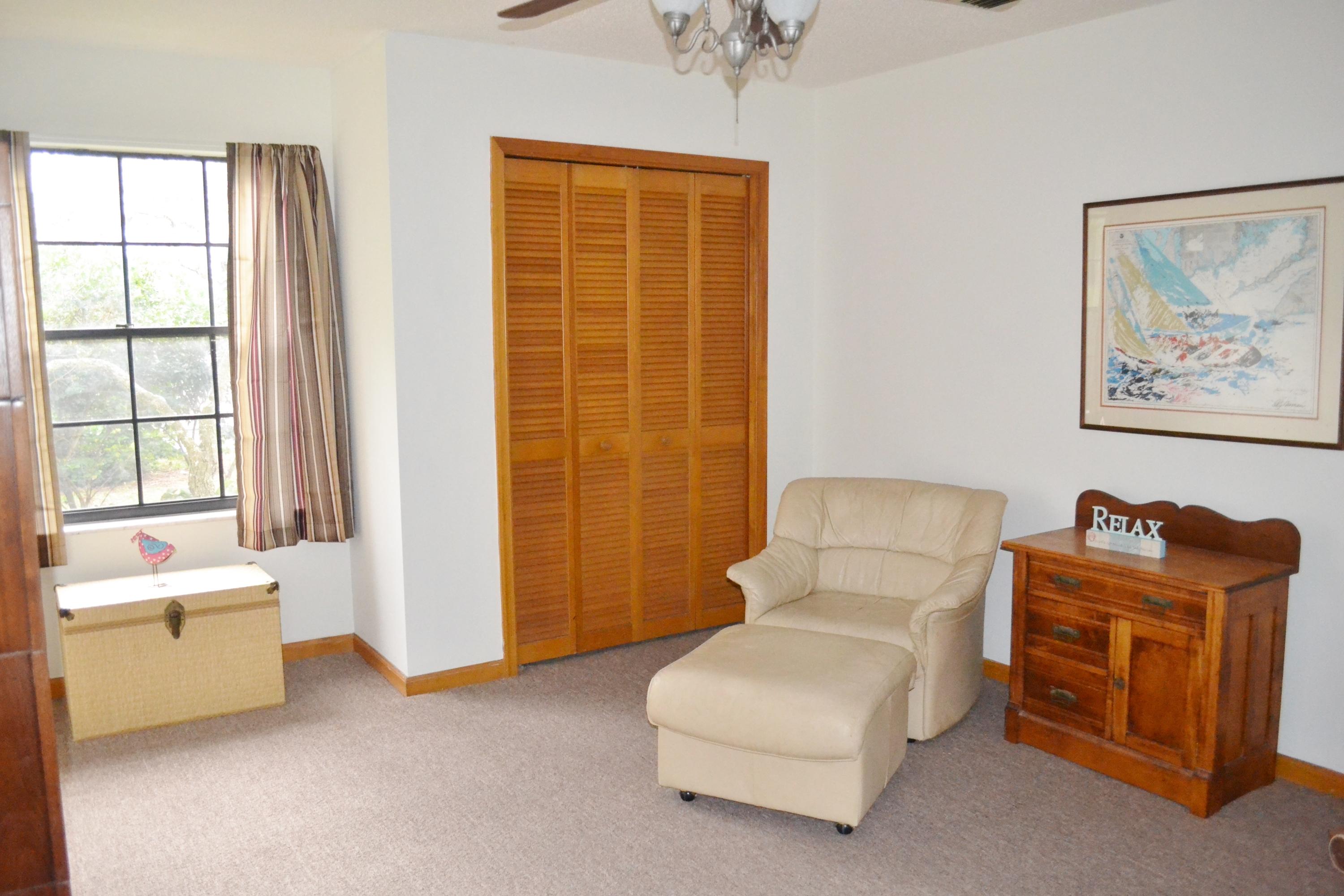 6063 Wood Lake Road Jupiter, FL 33458 - Photo 33 of 60 CEILING FAN IN BEDROOM #2