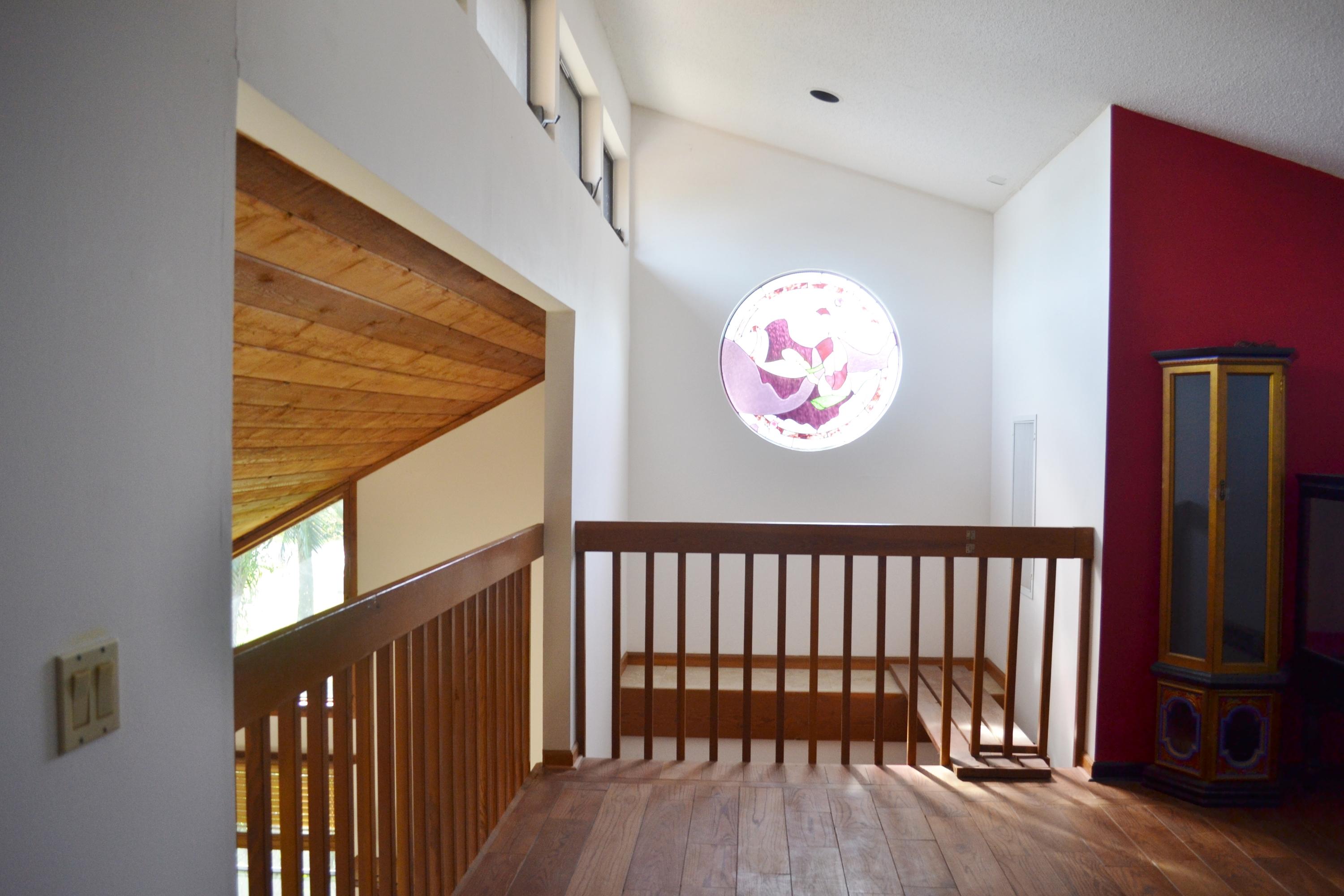 6063 Wood Lake Road Jupiter, FL 33458 - Photo 39 of 60 STAINED GLASS SKYLIGHT SEEN FROM LOFT