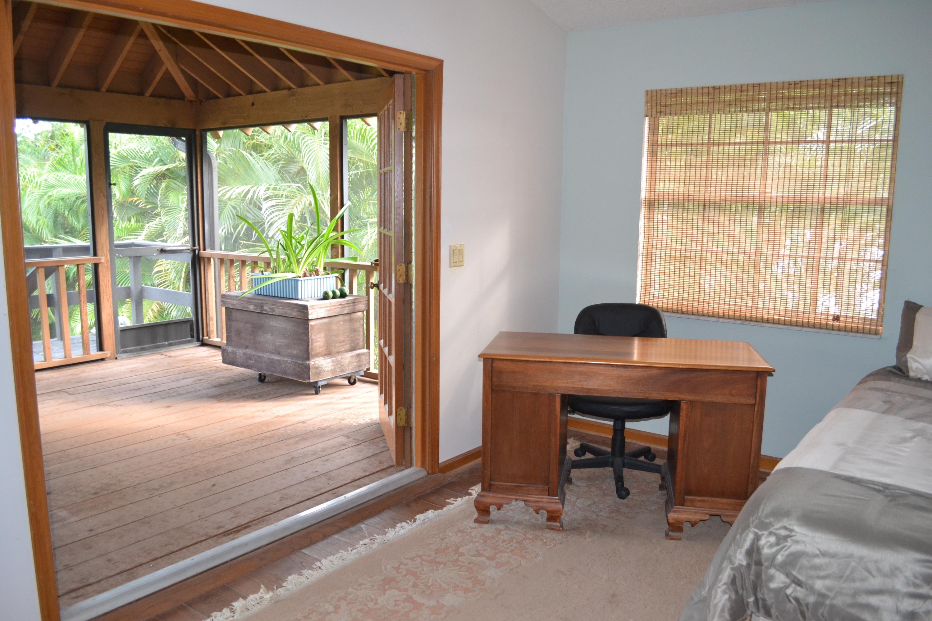 6063 Wood Lake Road Jupiter, FL 33458 - Photo 43 of 60 SCREENED PORCH OFF THE MASTER SUITE