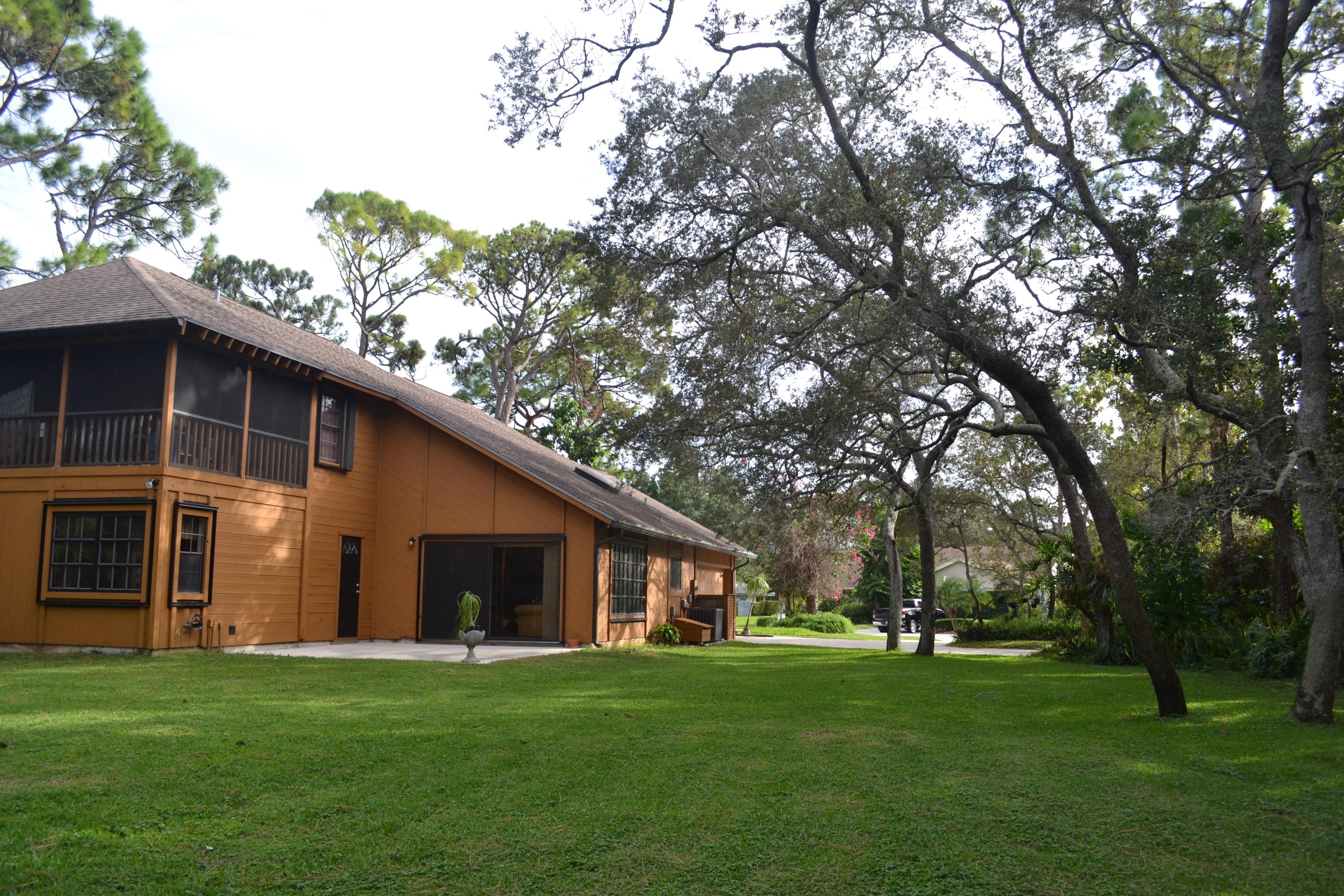 6063 Wood Lake Road Jupiter, FL 33458 - Photo 51 of 60 LOVELY TREES ON OVER A HALF ACRE LOT