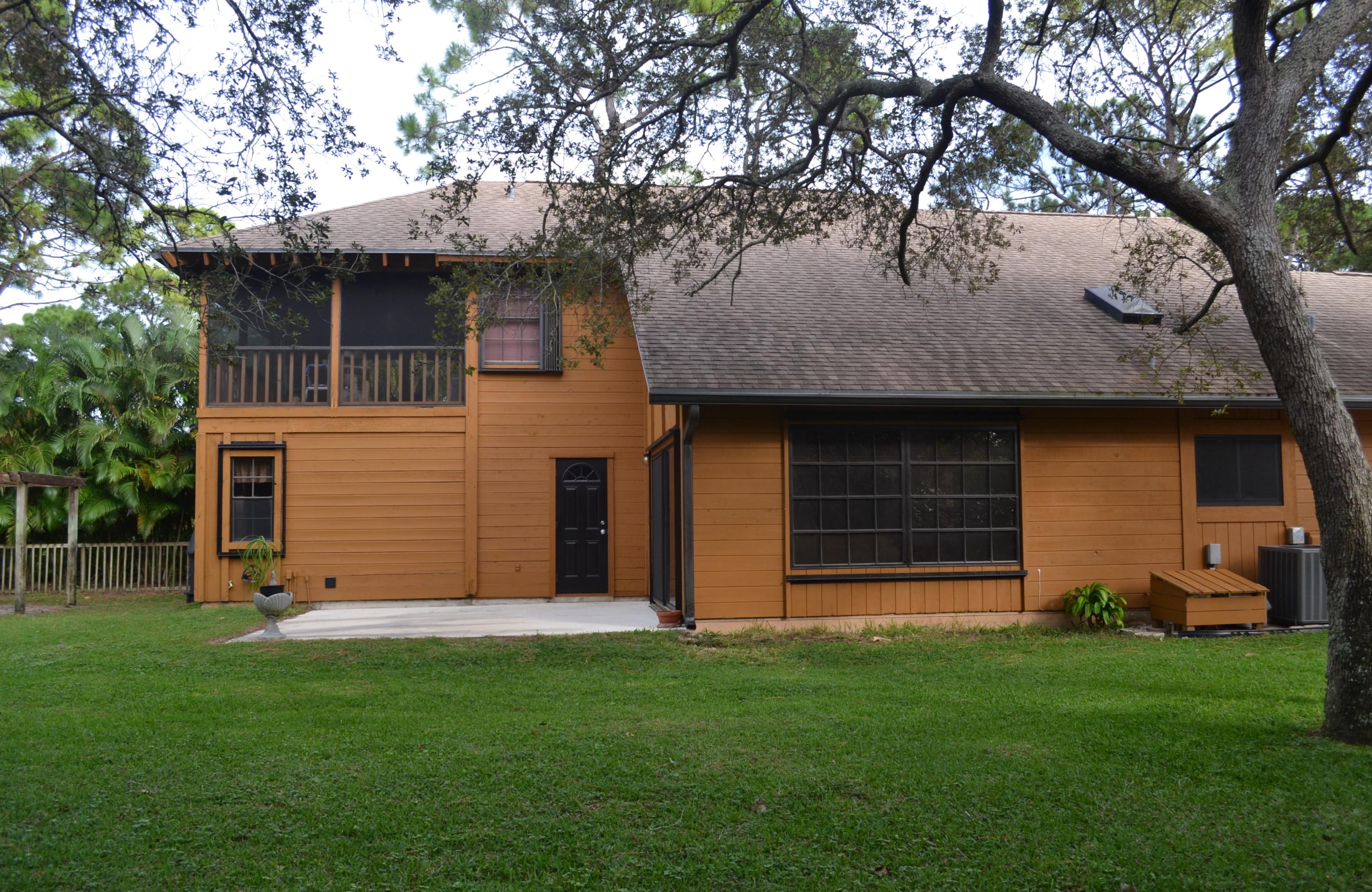 6063 Wood Lake Road Jupiter, FL 33458 - Photo 52 of 60 SIDE EXTERIOR VIEW OF BACK DECK