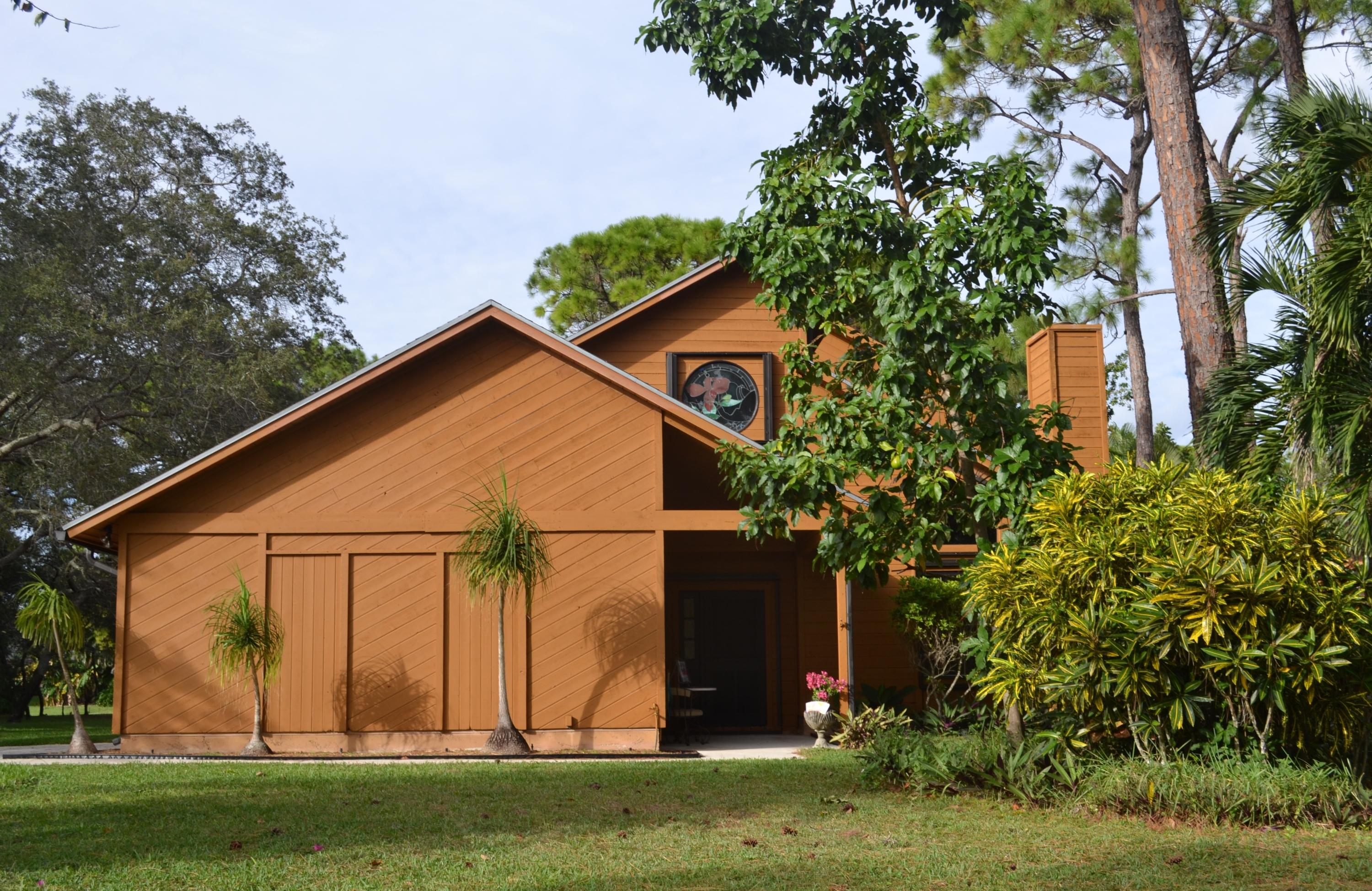 6063 Wood Lake Road Jupiter, FL 33458 - Photo 53 of 60 FRONT EXTERIOR VIEW OF HOME
