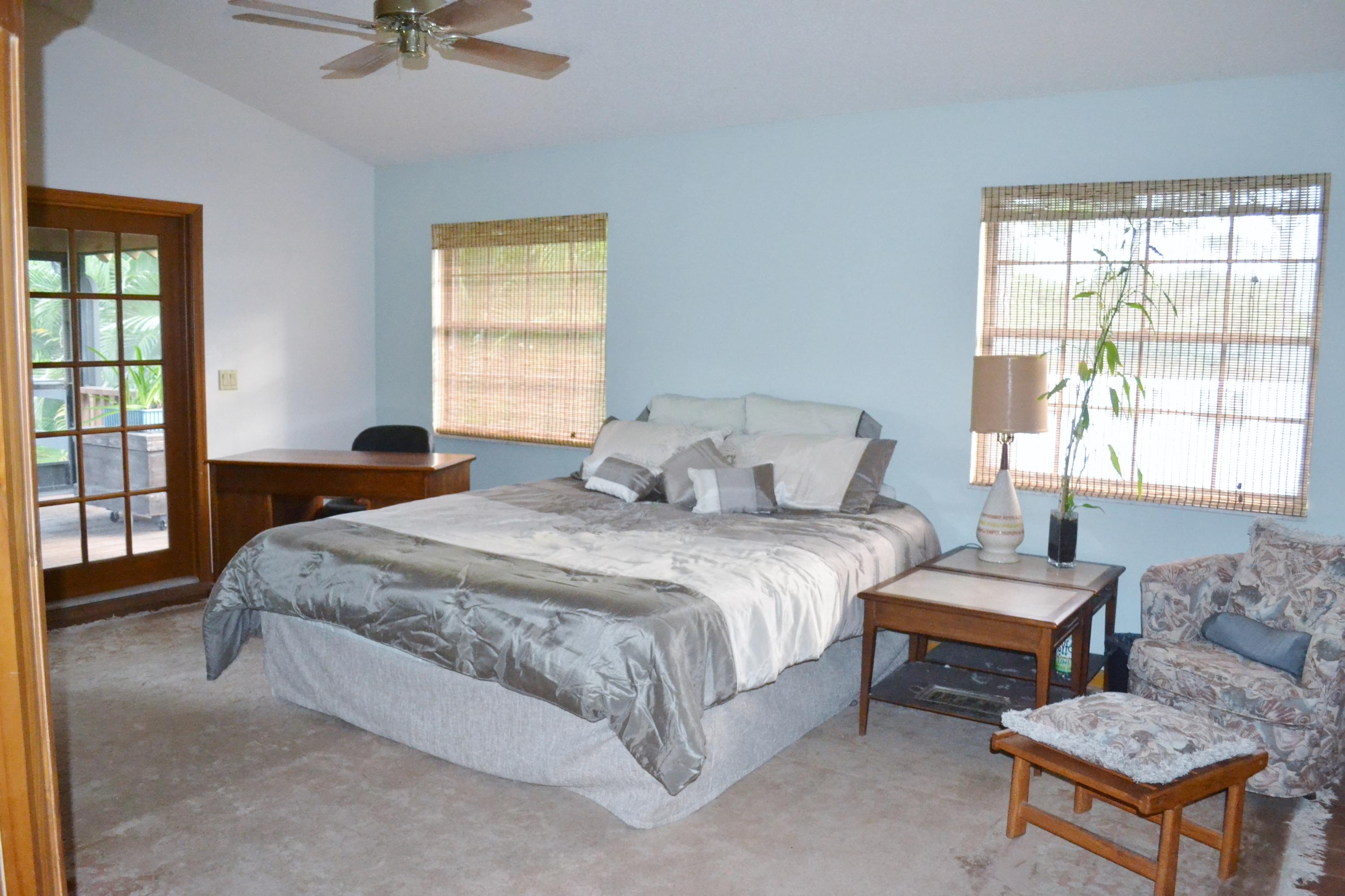 6063 Wood Lake Road Jupiter, FL 33458 - Photo 9 of 60 MASTER BEDROOM OPENS TO SCREEN PORCH
