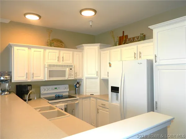 $440,000 | 248 Plaza Gardens Court, Unit 1B, Camdenton, MO 65020