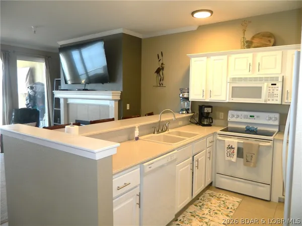 $440,000 | 248 Plaza Gardens Court, Unit 1B, Camdenton, MO 65020