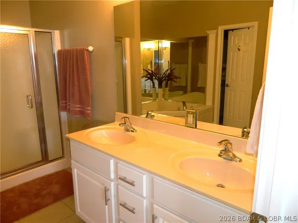 $440,000 | 248 Plaza Gardens Court, Unit 1B, Camdenton, MO 65020