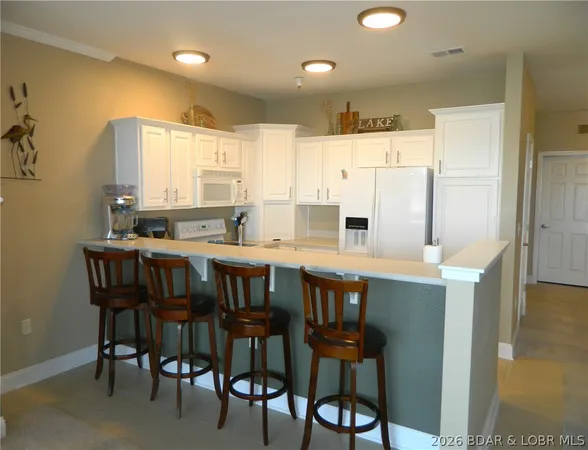 $440,000 | 248 Plaza Gardens Court, Unit 1B, Camdenton, MO 65020