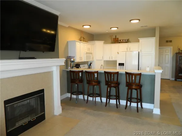 $440,000 | 248 Plaza Gardens Court, Unit 1B, Camdenton, MO 65020