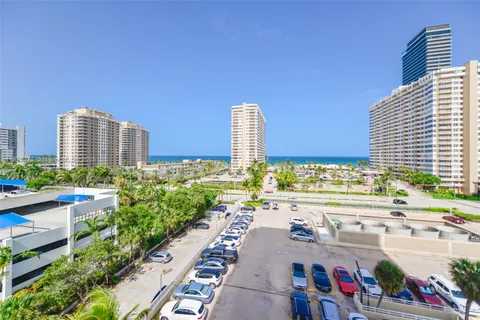 a view of a city with tall buildings