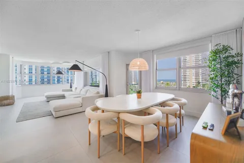 a view of a livingroom with furniture and a table
