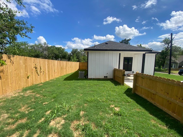 116 Field Street Luling, TX 78648 - Photo 12 of 33 Newly fenced backyard offers a secluded and green outdoor retreat.