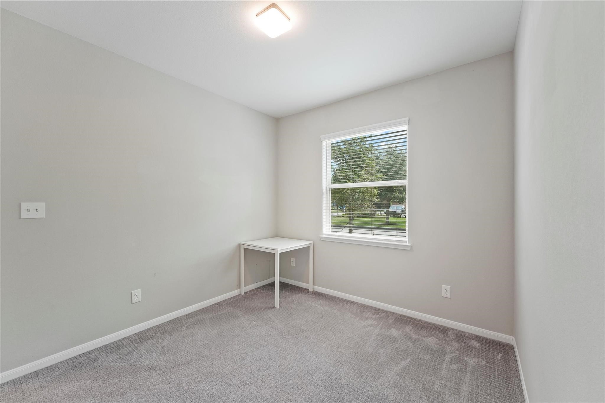 15103 Dry Ridge Court Humble, TX 77346 - Photo 15 of 28 an empty room with a window