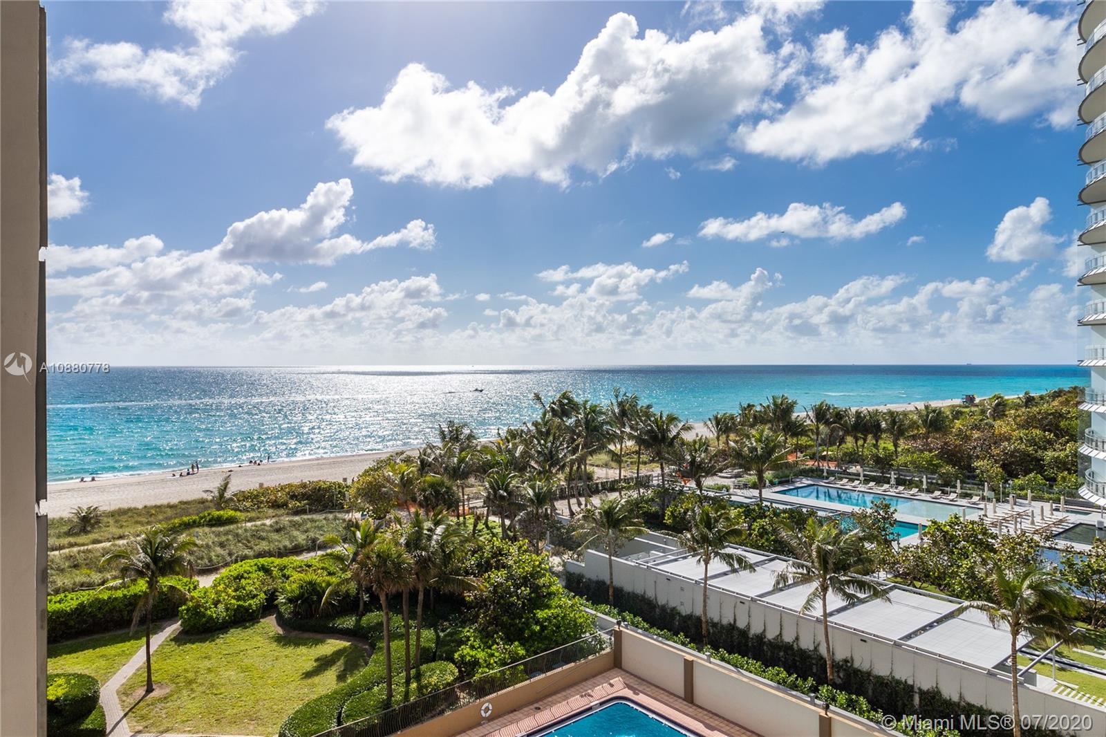 8777 Collins Avenue, Unit 611 Surfside, FL 33154 - Photo 2 of 22 a view of a lake with a city