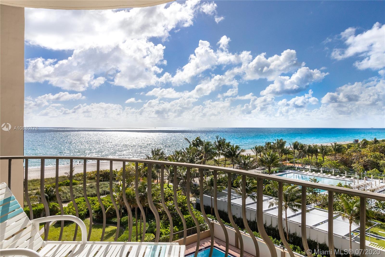 8777 Collins Avenue, Unit 611 Surfside, FL 33154 - Photo 3 of 22 a view of a city skyline from a balcony