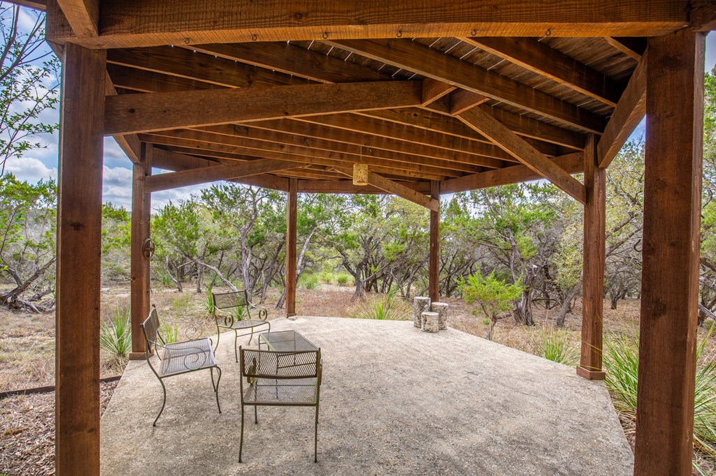 Tbd Tbd Other Bulverde, TX 78163 - Photo 18 of 42 a patio with a yard table and chairs