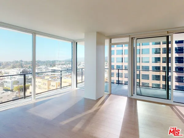 a view of a room with a large window