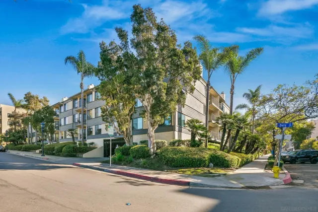 a view of a building with a street