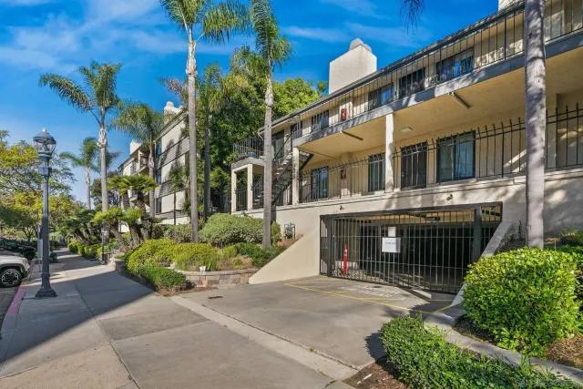 a living room with furniture rug and window