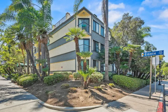 a view of a building with a yard