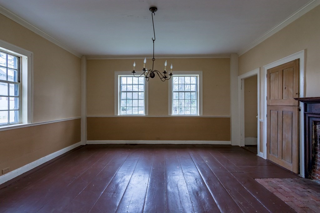 11 Ed Clark Road Hubbardston, MA 01452 - Photo 20 of 42 an empty room with wooden floor and windows