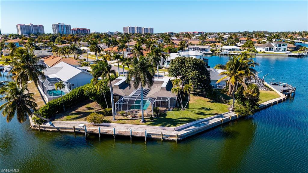 875 Robin Court Marco Island, FL 34145 - Photo 2 of 30 an aerial view of a house with a ocean view