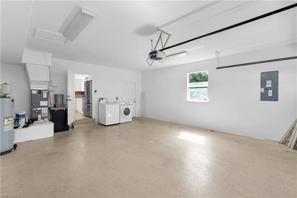 875 Robin Court Marco Island, FL 34145 - Photo 26 of 30 a view of a livingroom with furniture and a flat screen tv