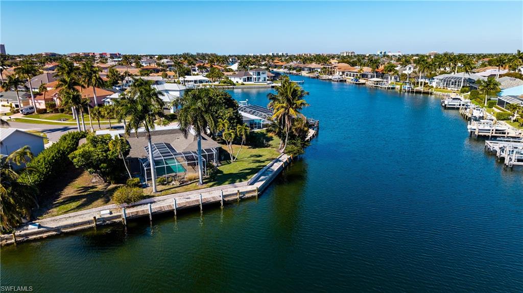 875 Robin Court Marco Island, FL 34145 - Photo 29 of 30 an aerial view of residential houses with outdoor space