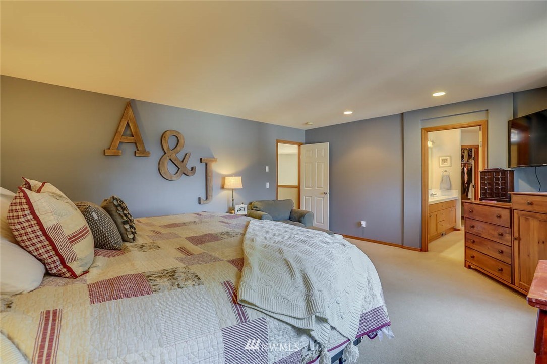 363 Pasco Drive Northeast Renton, WA 98059 - Photo 15 of 26 a bedroom with a bed and dresser