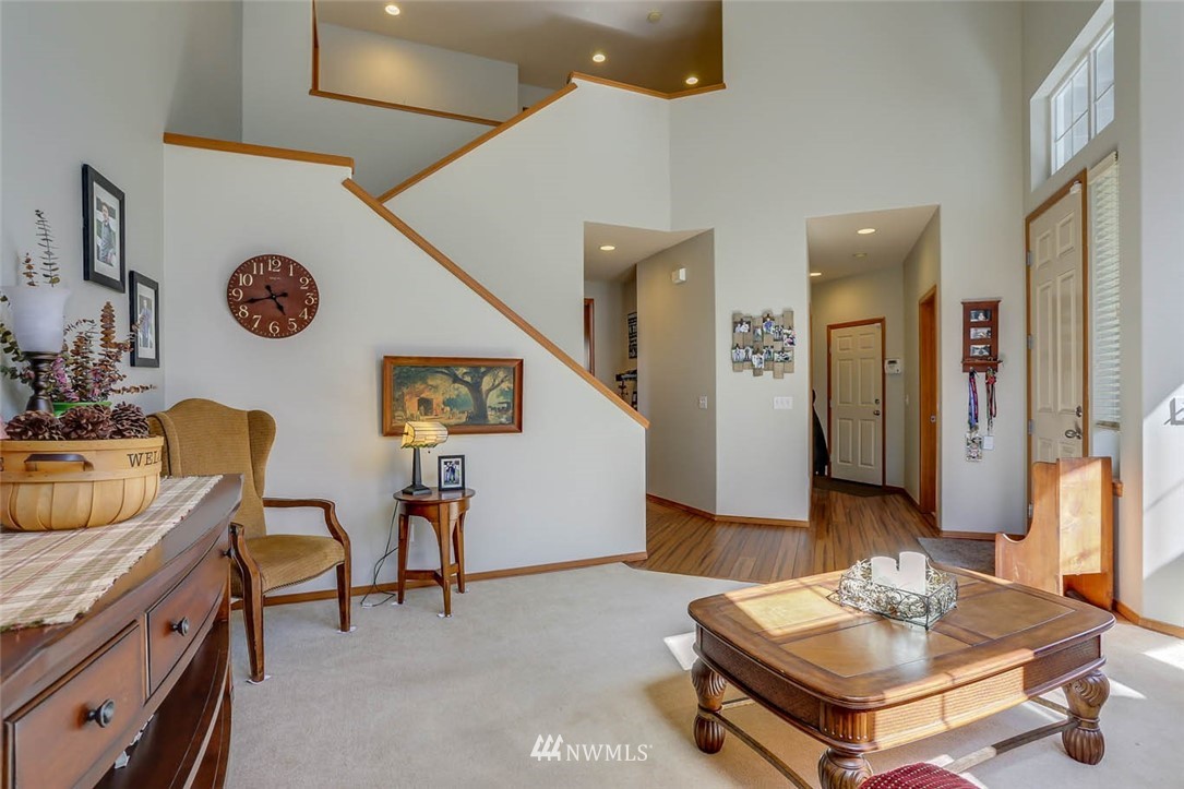 363 Pasco Drive Northeast Renton, WA 98059 - Photo 3 of 26 a living room with furniture and a wooden floor