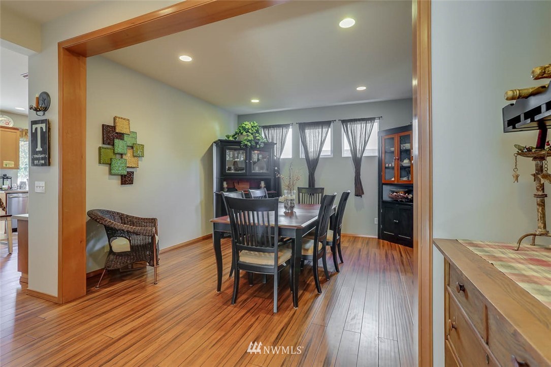 363 Pasco Drive Northeast Renton, WA 98059 - Photo 6 of 26 a dining room with furniture and wooden floor