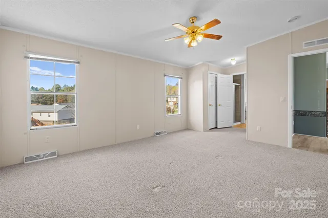 a bathroom with double sink and a mirror