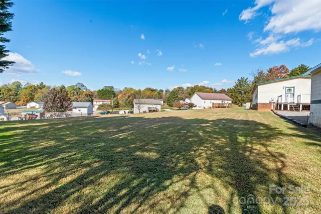 a view of a patio with a yard