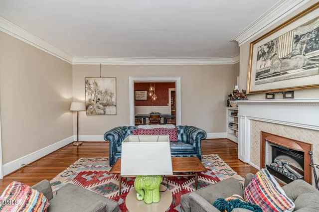 a bathroom with a toilet a sink and a shower curtain
