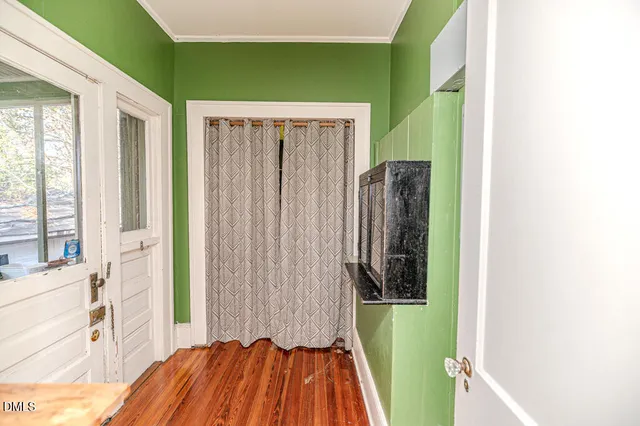 a white bath tub sitting next to a white sink