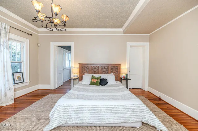 a view of balcony with wooden floor and fence
