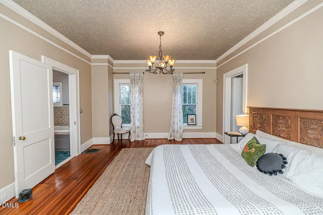 a front view of a house with parking area