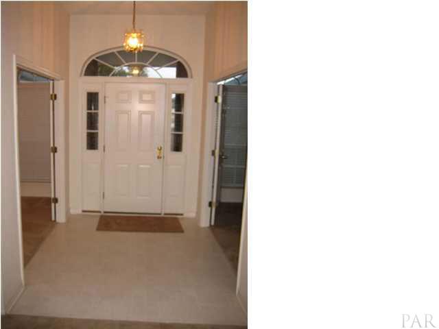 7045 Woodside Road Pensacola, FL 32526 - Photo 1 of 17 Large Foyer opens to the Living Room, Dining Room as well as the Great Room.