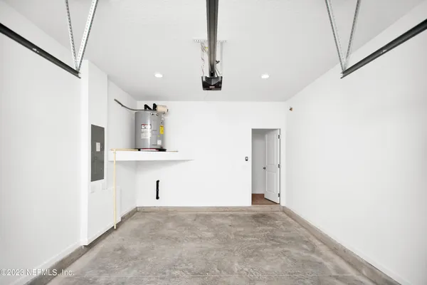 a view of a house with a back yard