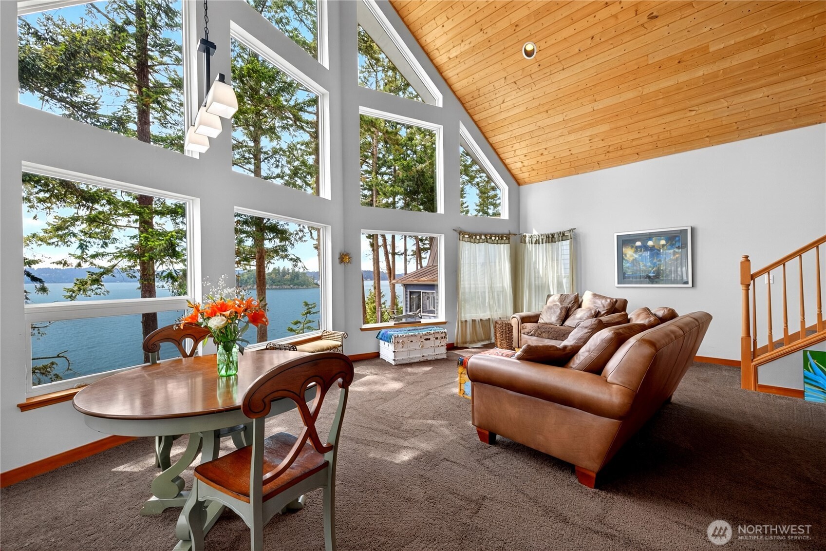 17946 Cobahud Road La Conner, WA 98257 - Photo 19 of 40 a living room with furniture and a large window