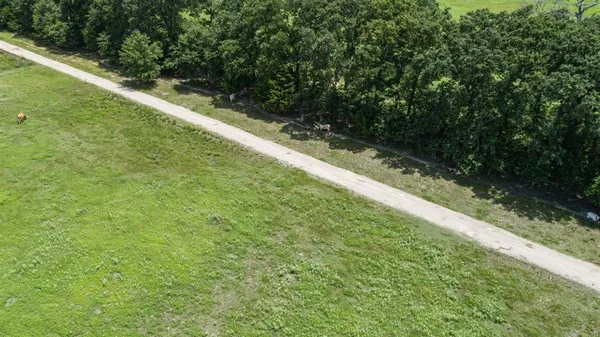 a view of a golf course with a garden