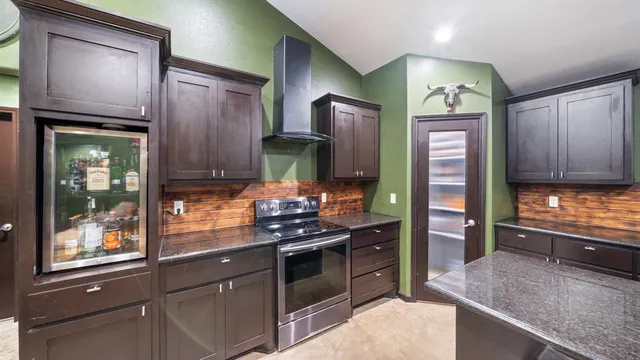 a bedroom with a bed and a table