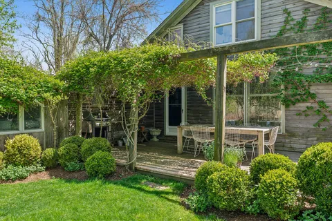 a garden view with a seating space