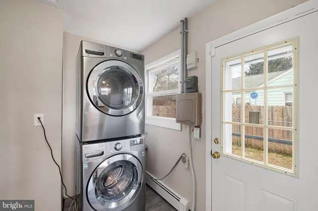 a utility room with dryer and washer