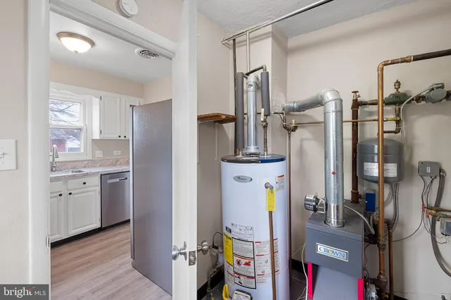 a view of a kitchen with appliances and cabinets