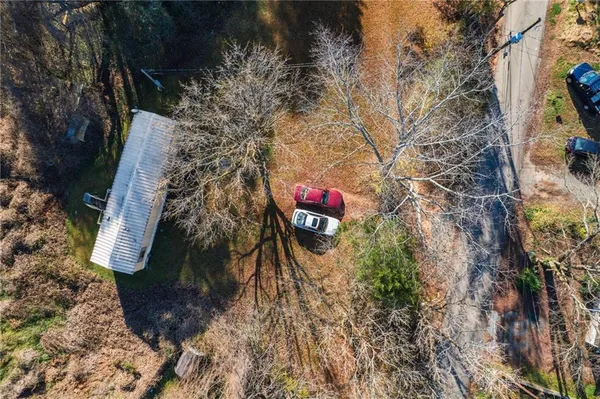 a view of house with yard