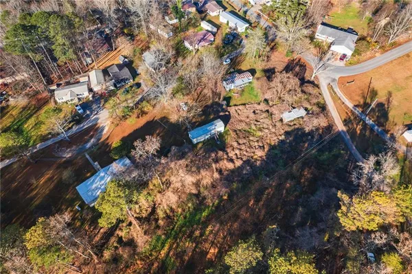 an aerial view of residential house with outdoor space