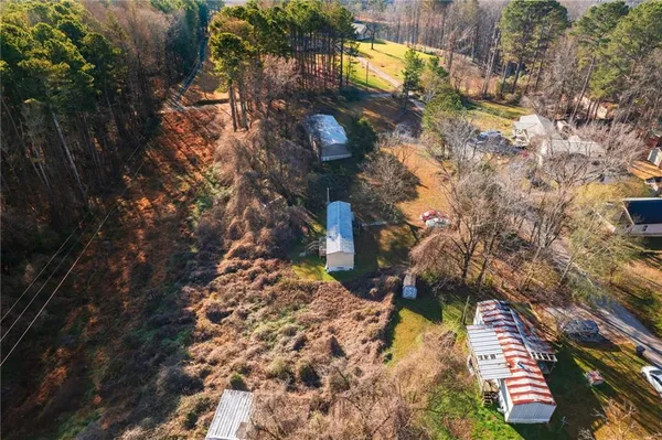 a backyard of a house with lots of green space