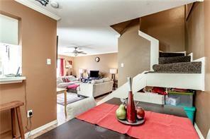 5626 Preston Oaks Road, Unit 39C Dallas, TX 75254 - Photo 32 of 38 Dining space with baseboards and ceiling fan