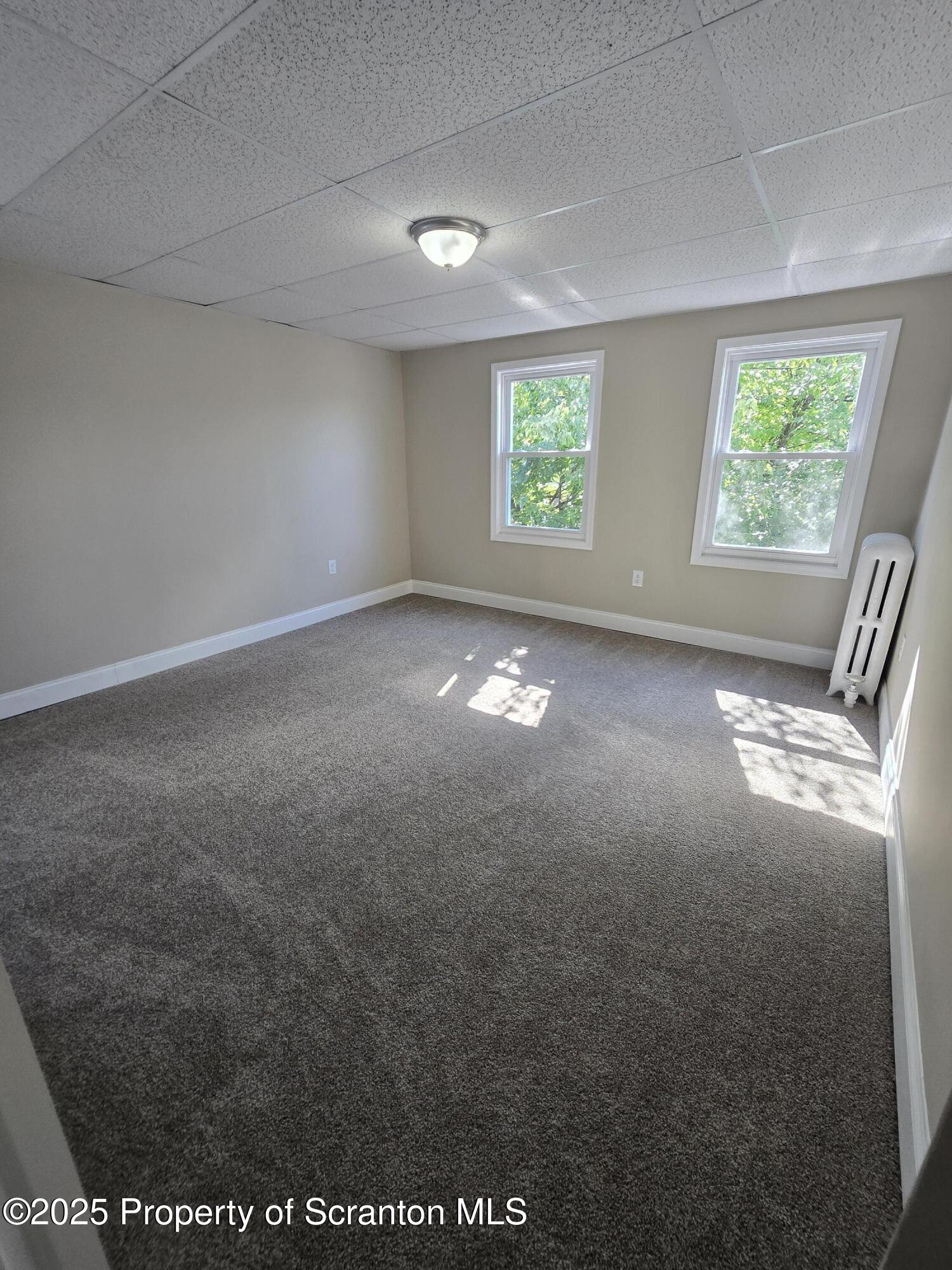 323 Larch Street Scranton, PA 18509 - Photo 14 of 18 an empty room with windows